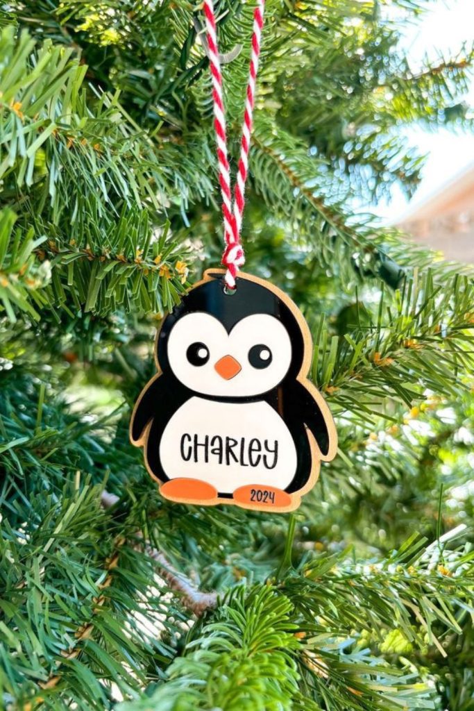Wooden penguin token winter ornament