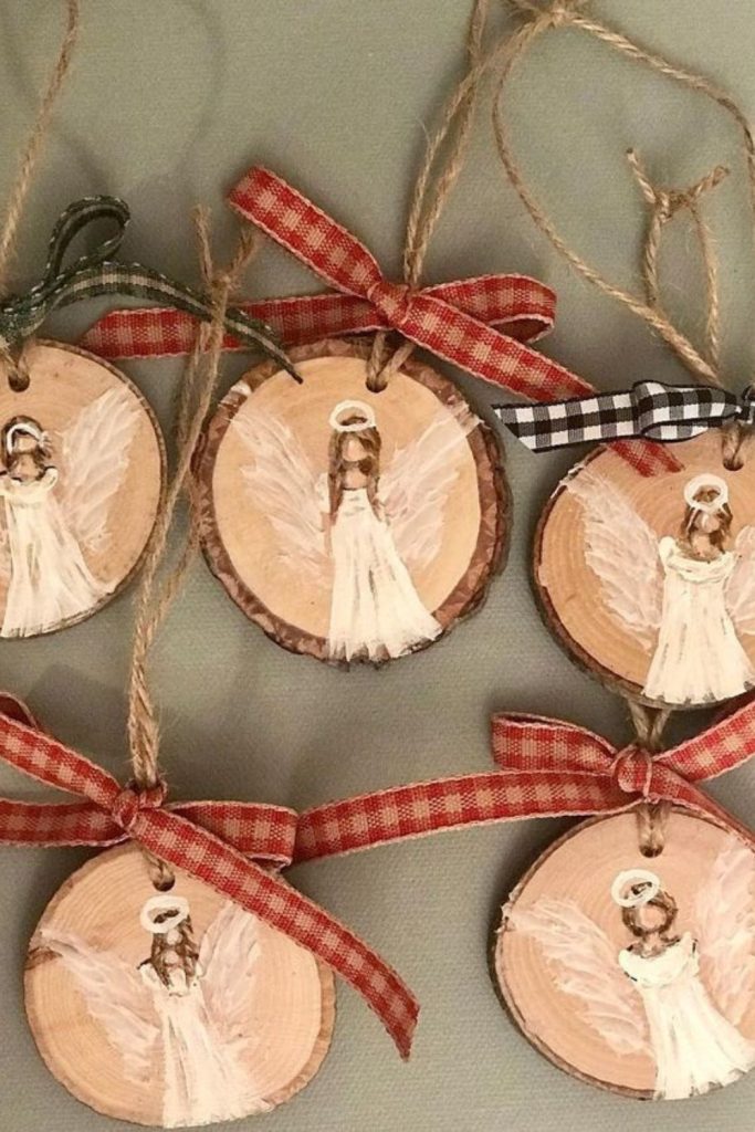 Tiny colorful angels crafted from wood