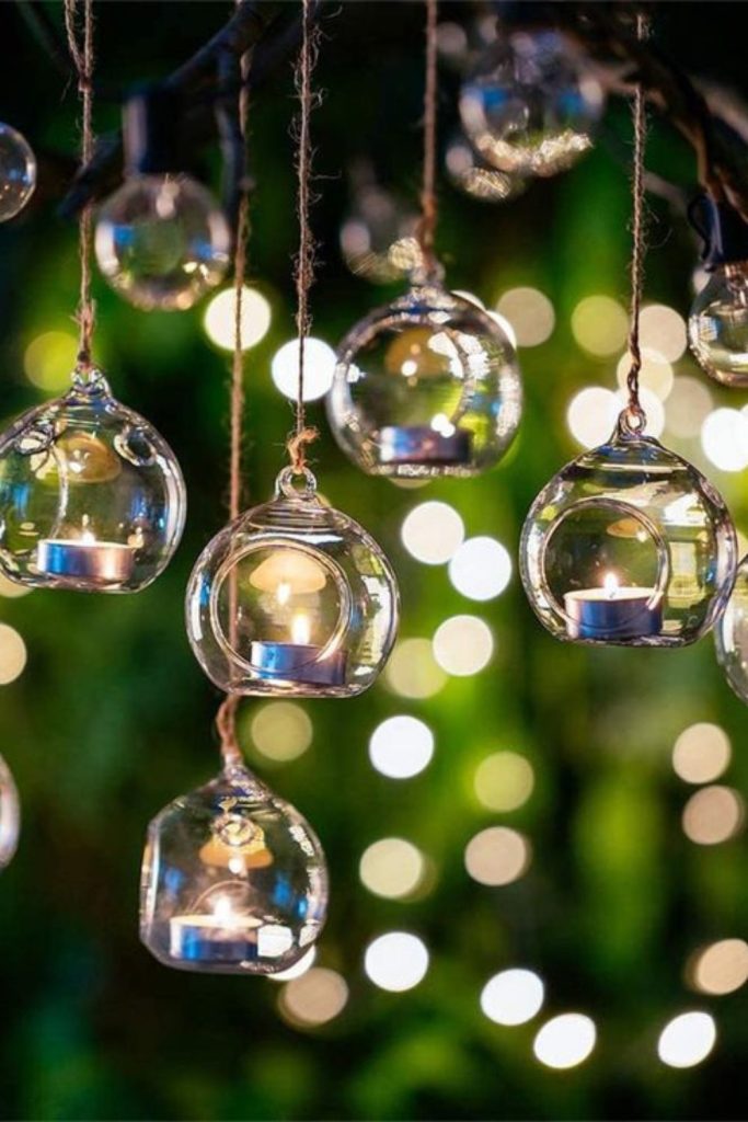 Hanging glass orbs with flowers