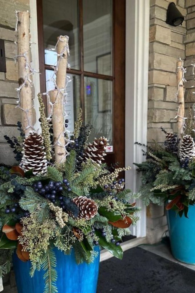 Icy blue magnolia leaf urn accent