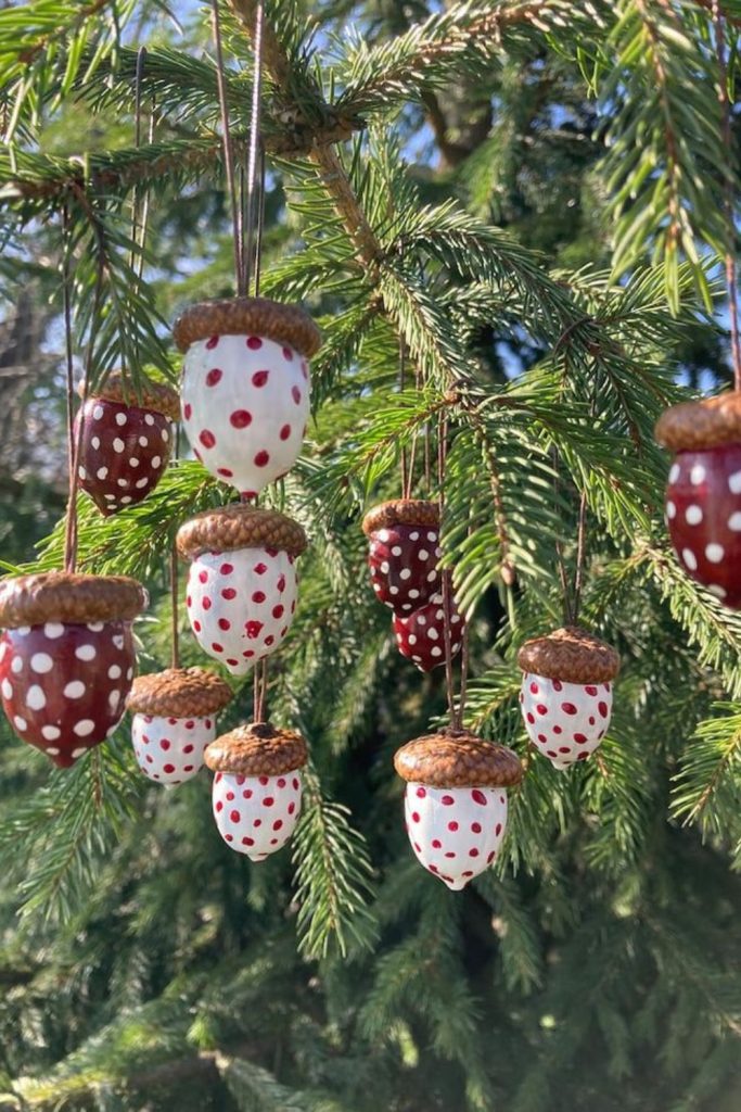Colorfully painted acorn cap decorations