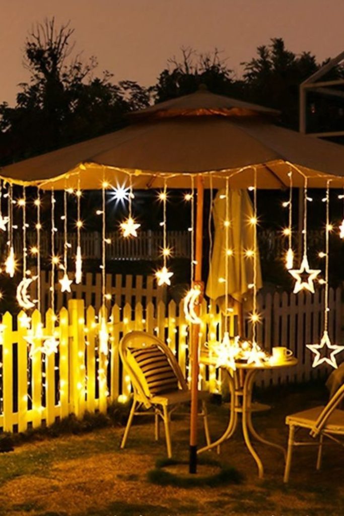 Gazebo decorated with string lights above
