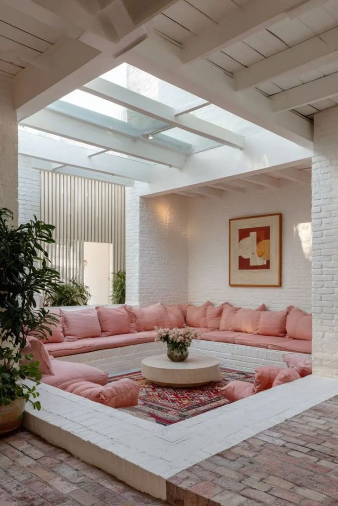 Sunken sofa nook with scattered pillows