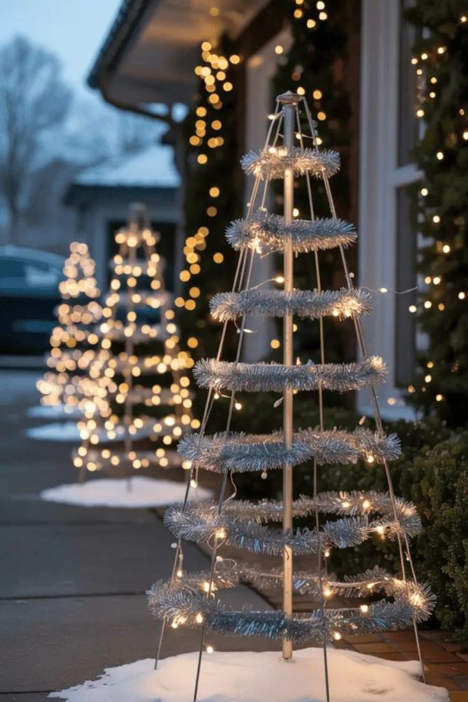 Lighted pillars along frosted garden walkway