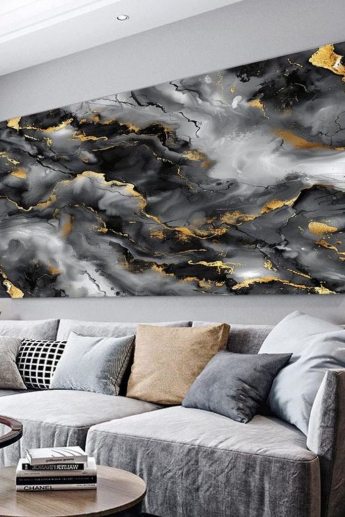 Dripping black ink on large canvases