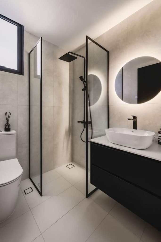 Black framed compact bathroom interior