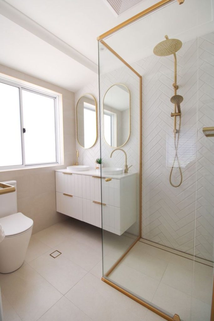 Sleek minimal brass accent bathroom