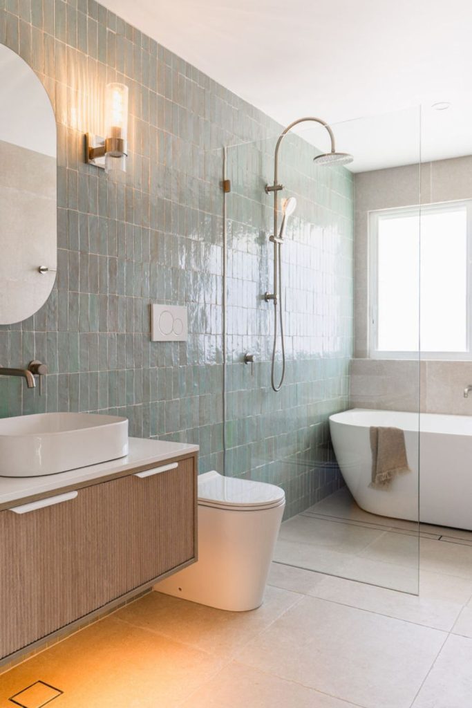 Beachy calm compact bathroom design