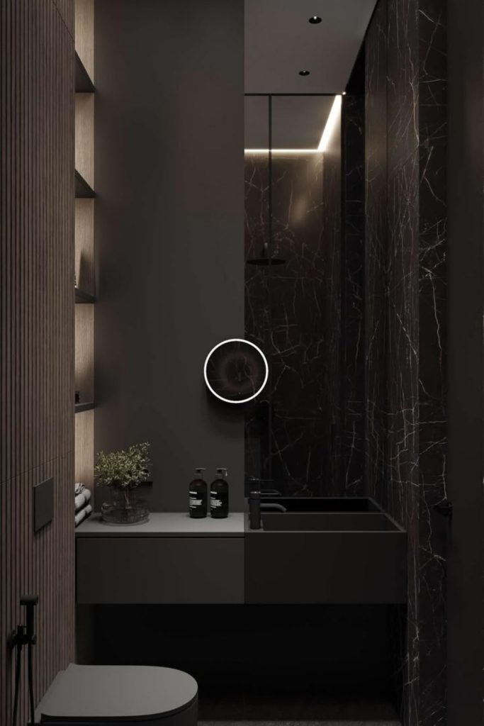 Moody intimate black accent bathroom