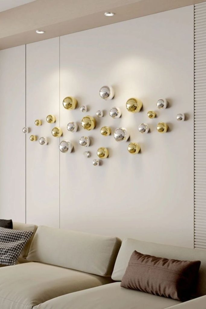 Floating metal spheres clustered on wall