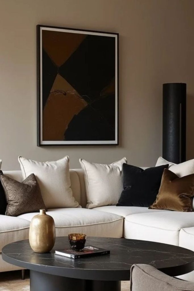 Textured beige living room black panels.