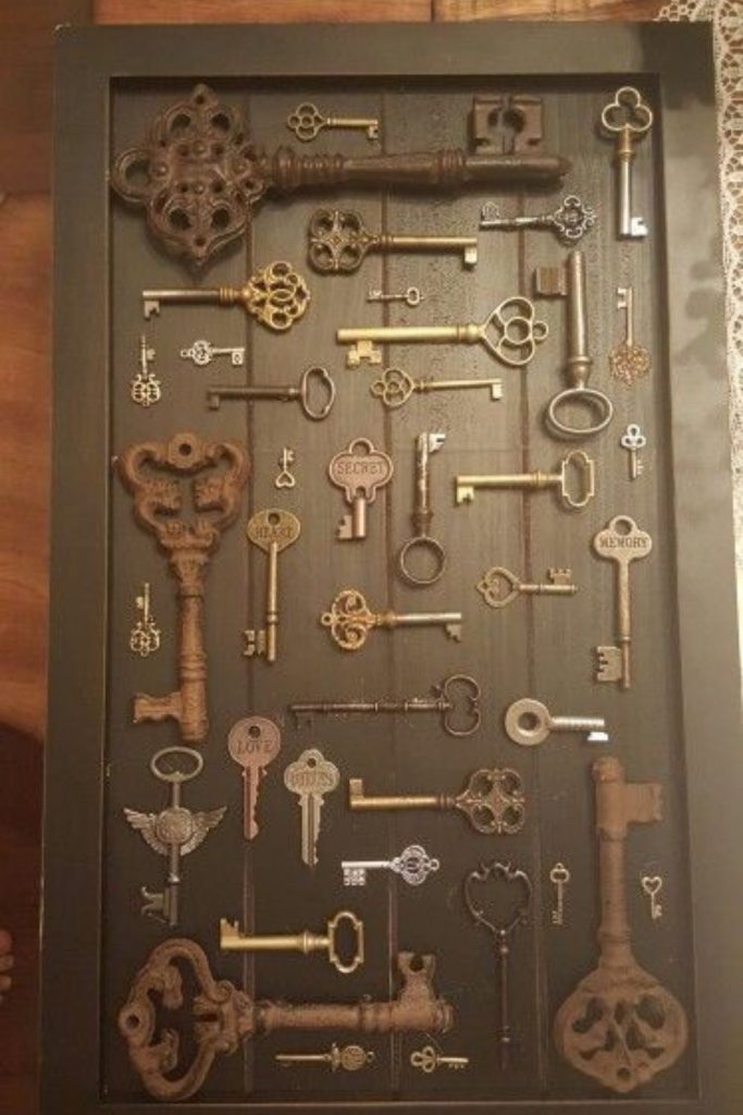 Antique keys mounted forming metallic wall tapestry