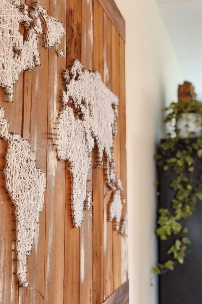 Colored threads forming tangled abstract wall network