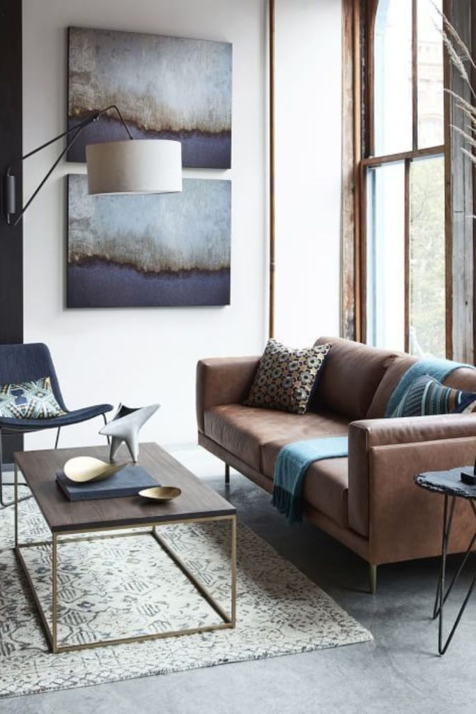 Metal-framed furniture with subtle industrial warmth.