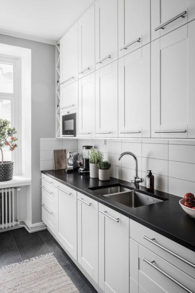 Chalk cabinets build tension with black.