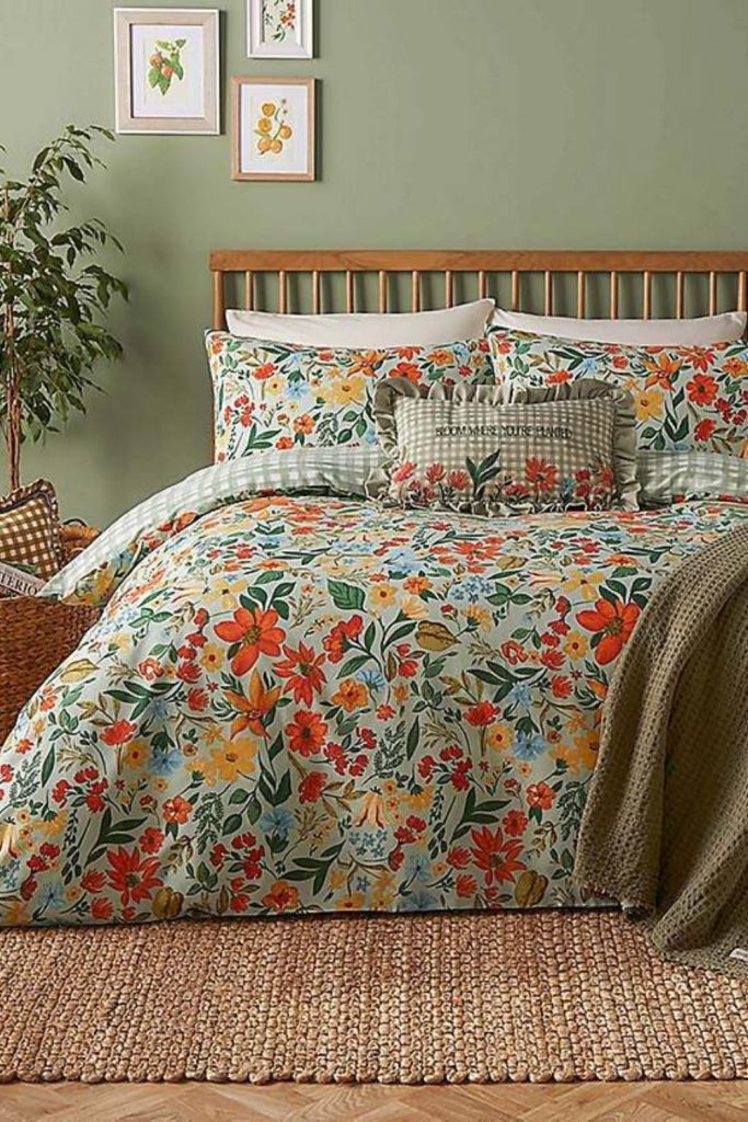 Fern print bedroom with cozy cushions