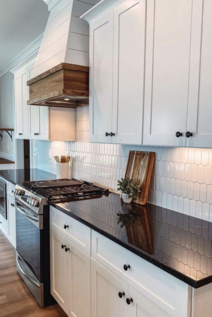 Frosted white cabinets clash with black.