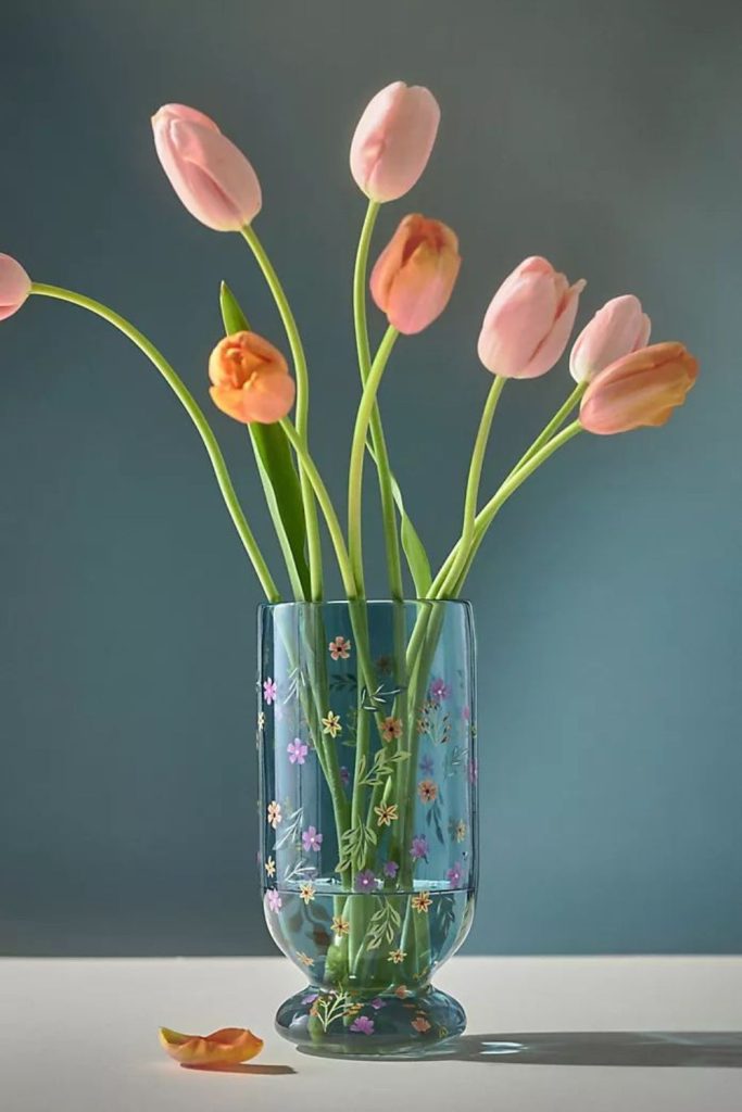 Artistic vase with fluid color streaks