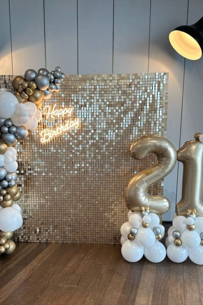 Sparkling metallic confetti and balloons