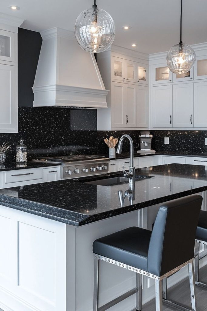 White cabinets glow above black countertops.
