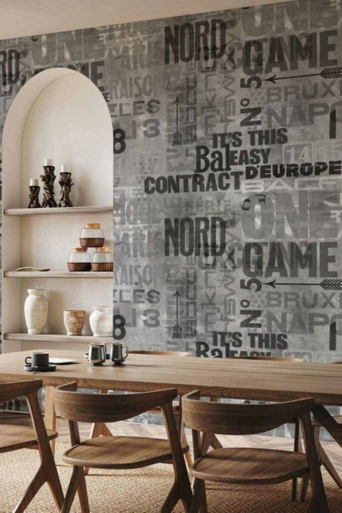 Bold letters cover wall in abstract layout.