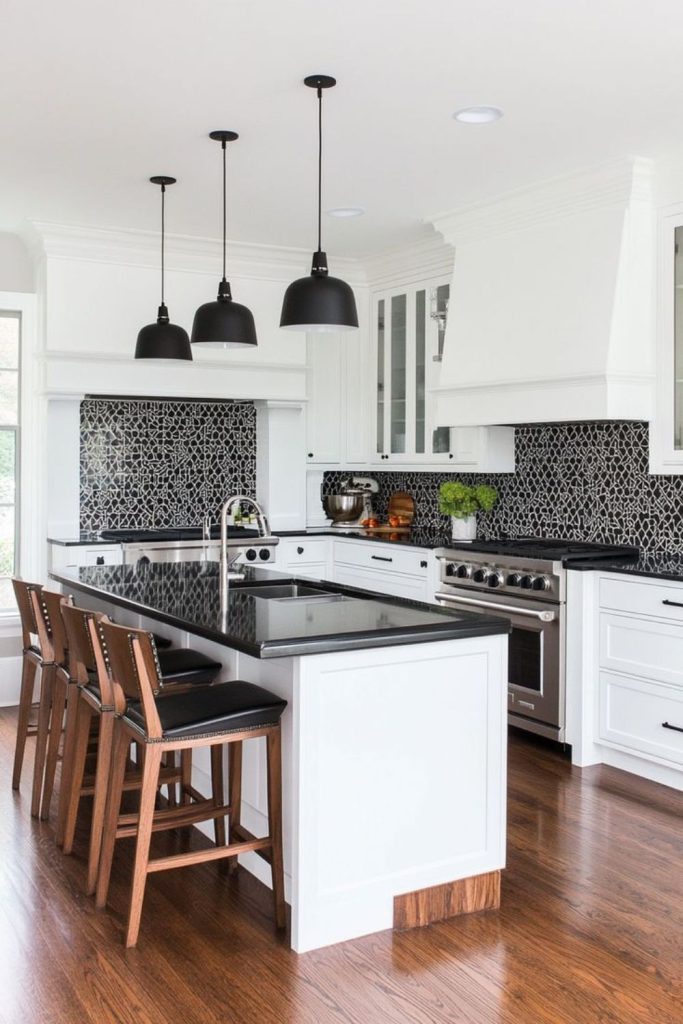Pale cabinets sharp with carbon counters.