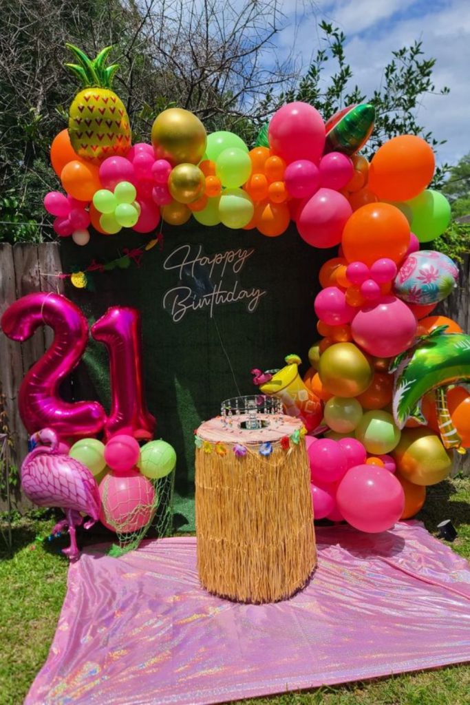Vibrant tropical themed party decor
