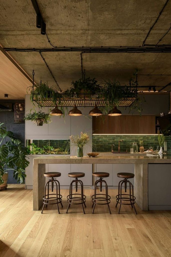Industrial kitchen with hanging greenery