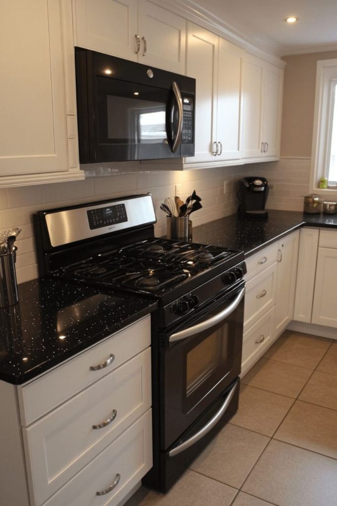Signal white cabinets against black countertops.