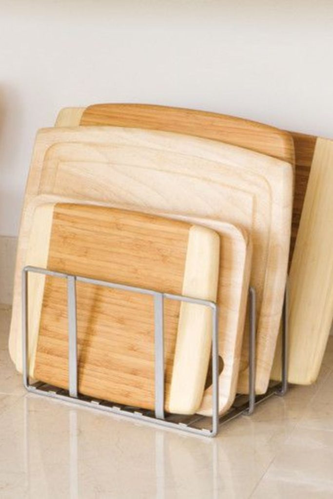 Wire racks hold boards upright securely.