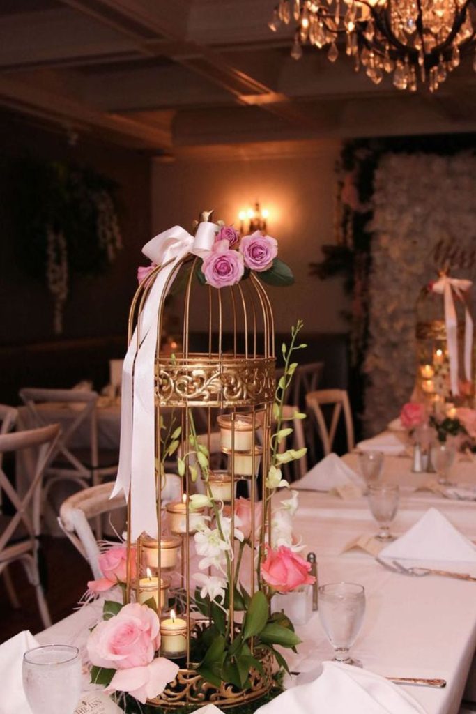 Birdcage floral centerpiece idea