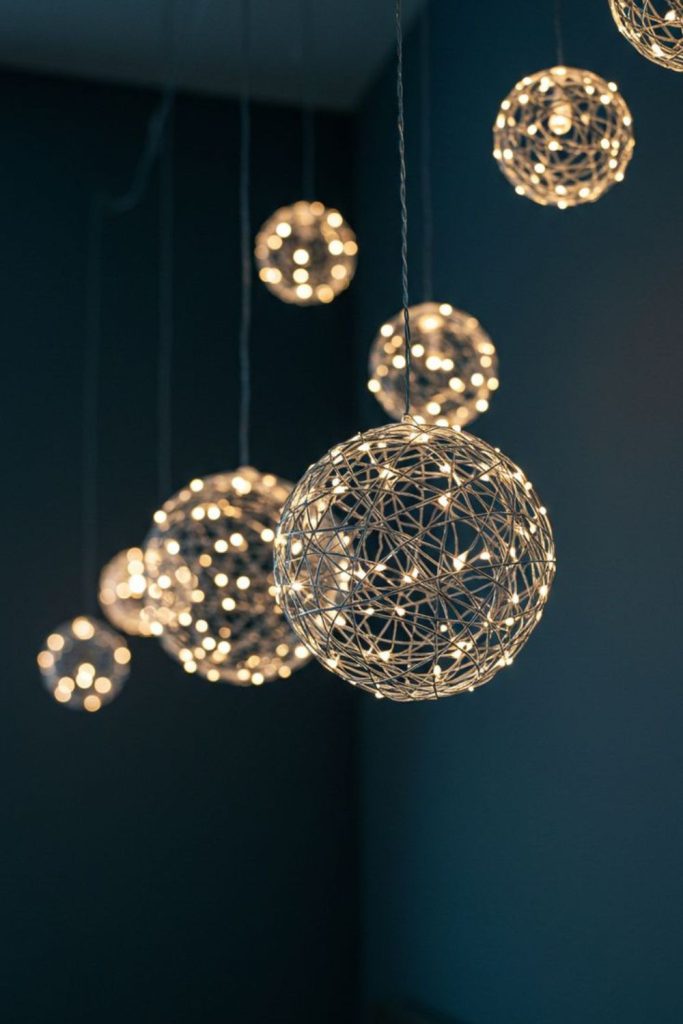 Hanging orbs create whimsical lighting