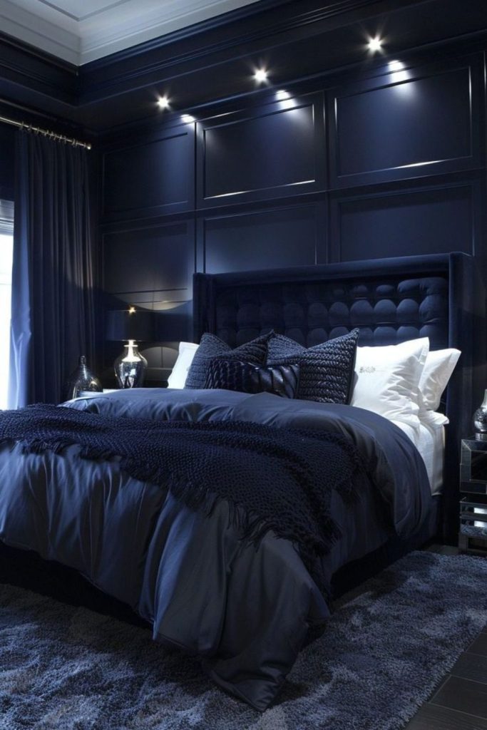Moody navy dark bedroom interior