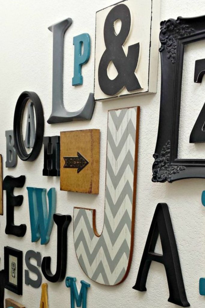 Family monogram surrounded by portrait frames.