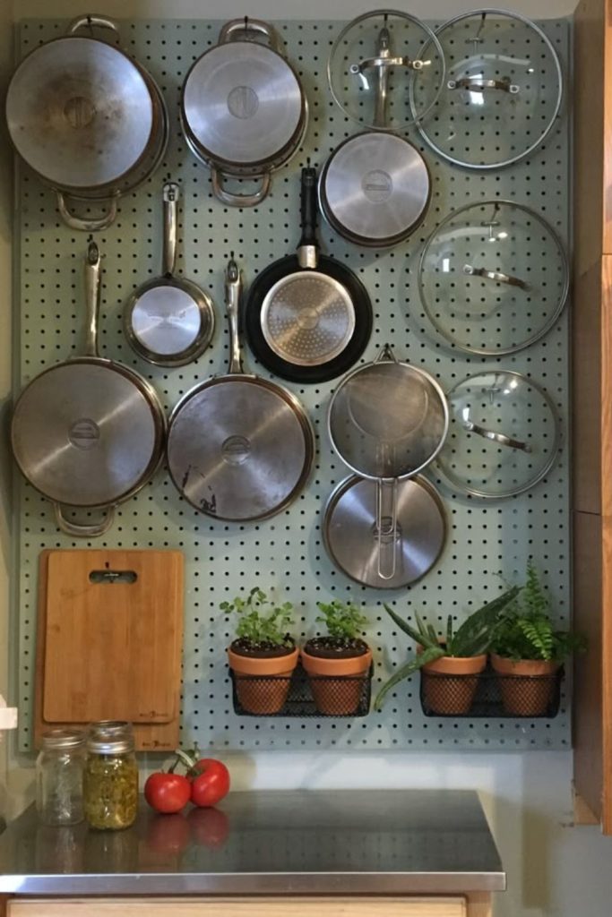 Metal lids clinging to wall vertically