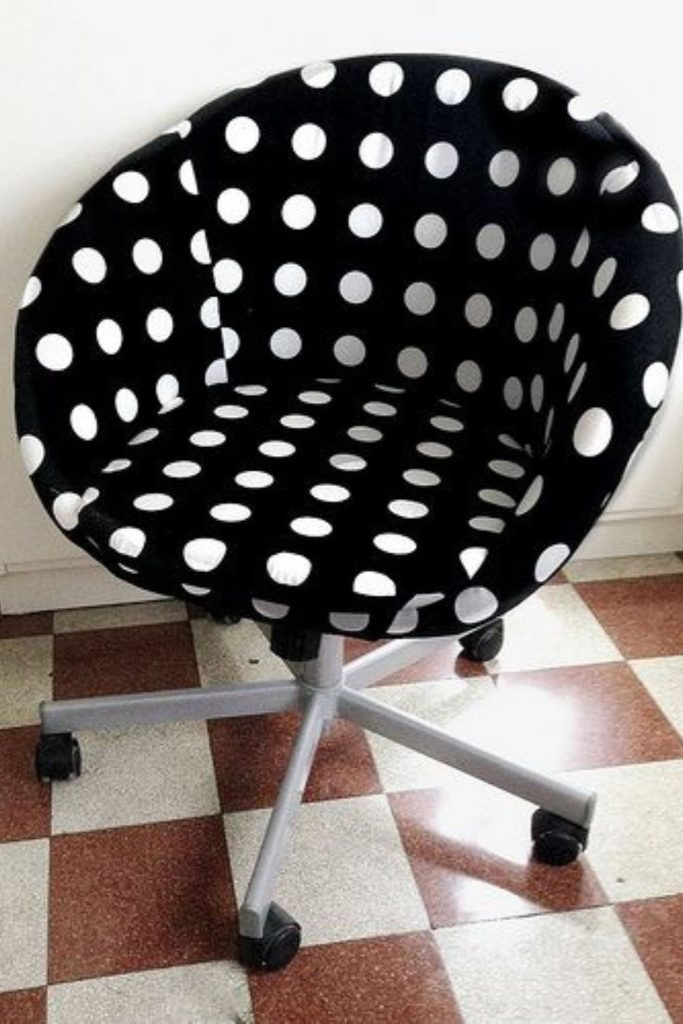 Chair painted with irregular colorful polka dots