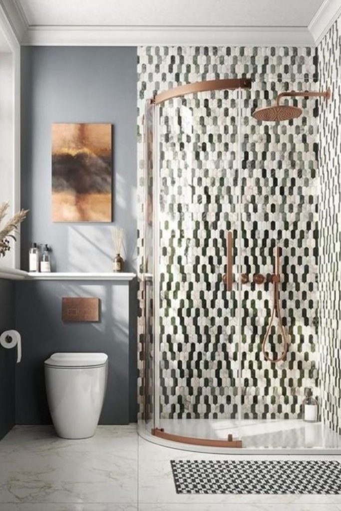 Slate pebble floor corner shower.