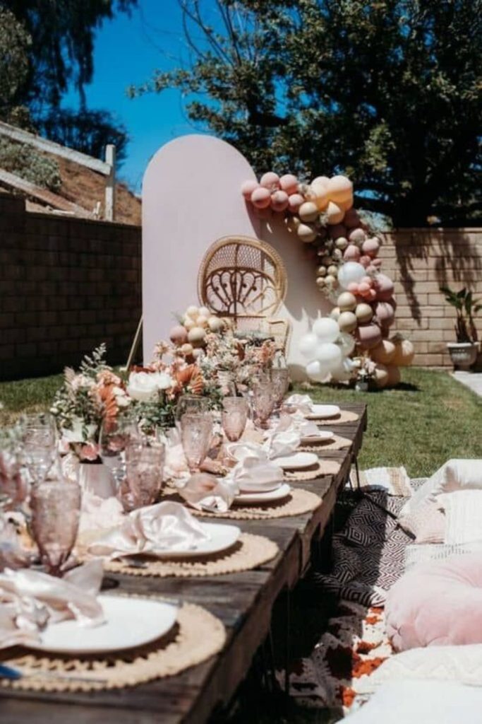 Boho garden picnic floor seating setup