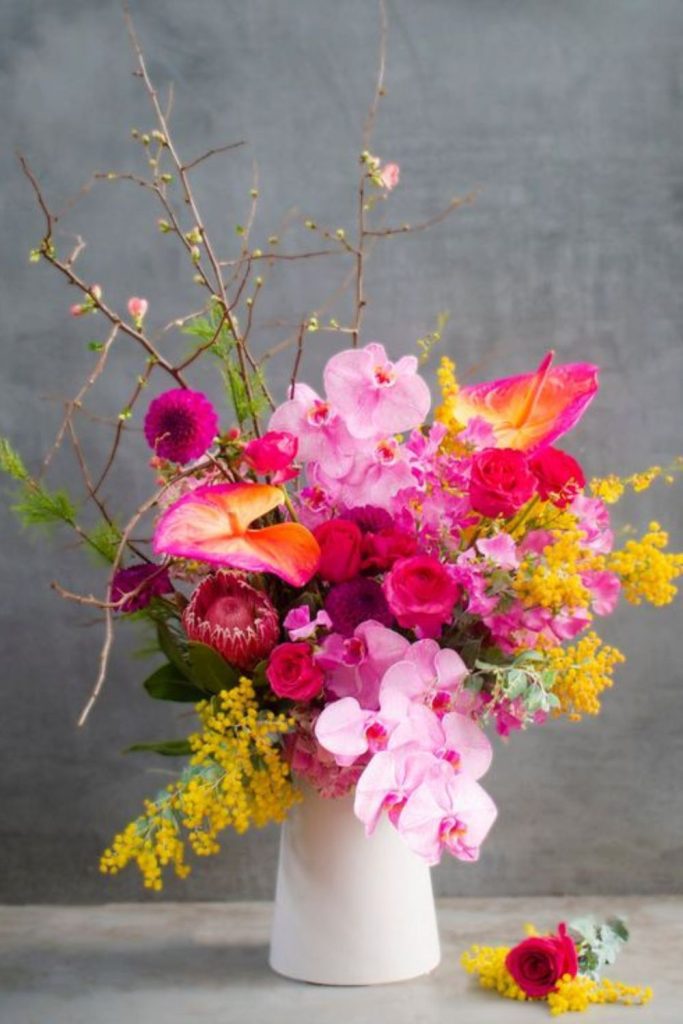 Neon fuchsia yellow turquoise blooms explosion