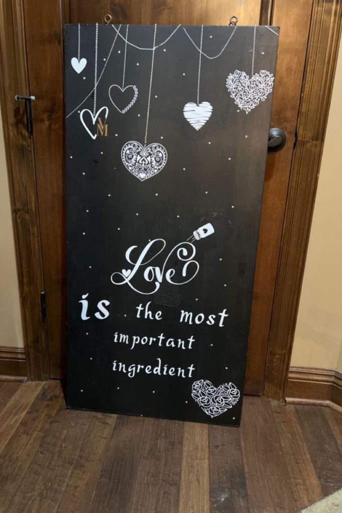 Multiple small chalkboards with love hearts.