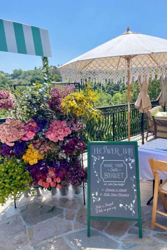 Bold chrysanthemums erupting unevenly over wood