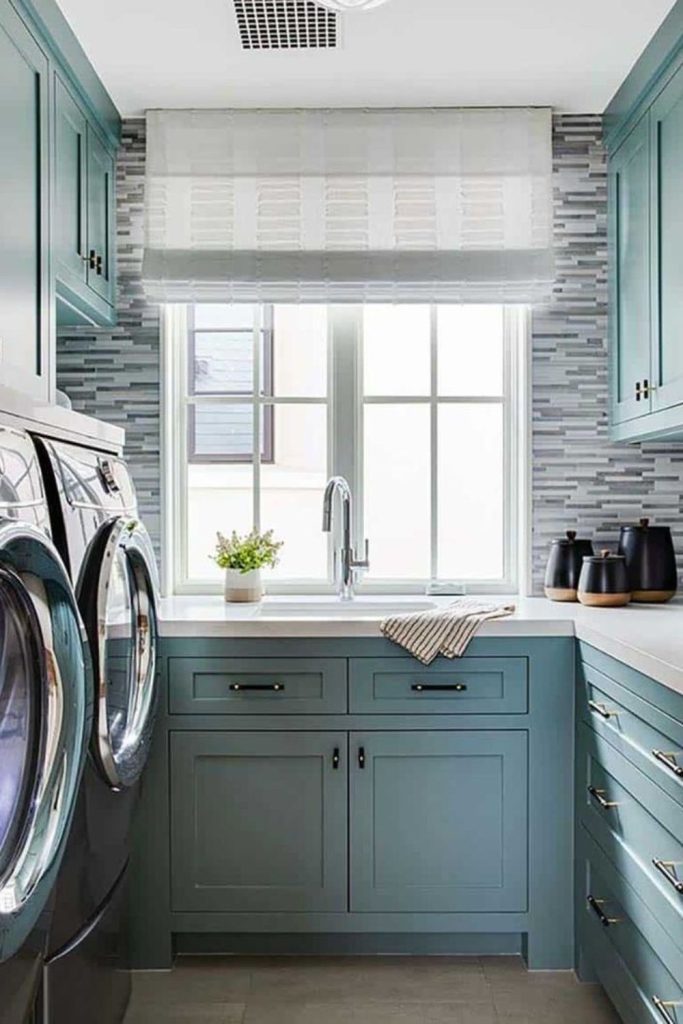 Aqua sink with driftwood-inspired cabinetry