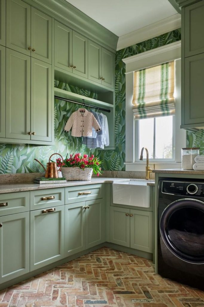 Sink with mint-colored whimsical cabinets