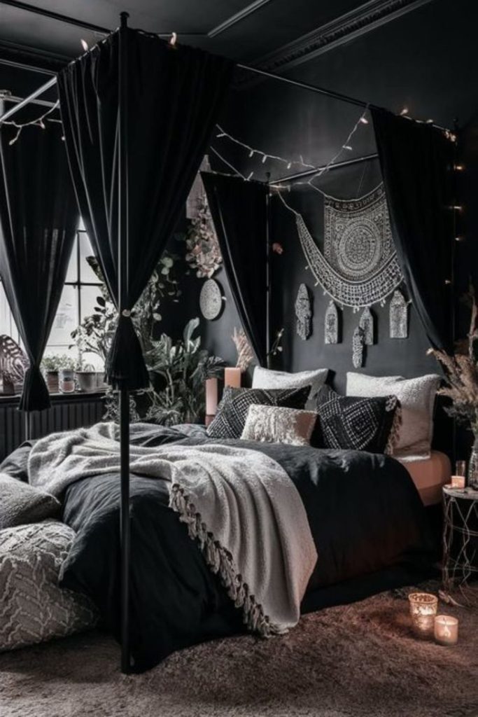 Cozy black canopy bed small snug bedroom.