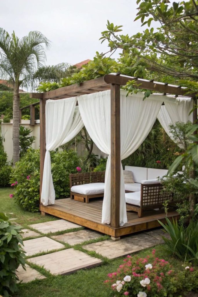 DIY pallet gazebo with flowing fabrics