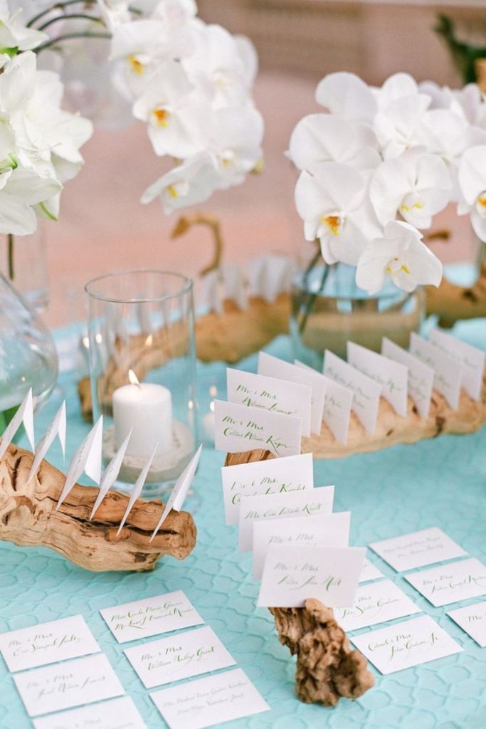 Driftwood coastal rustic wedding seating chart idea.