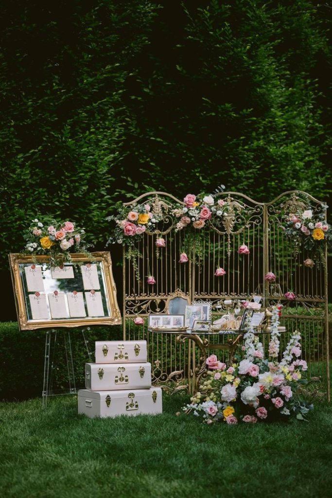 Floral garden gate romantic wedding seating chart.