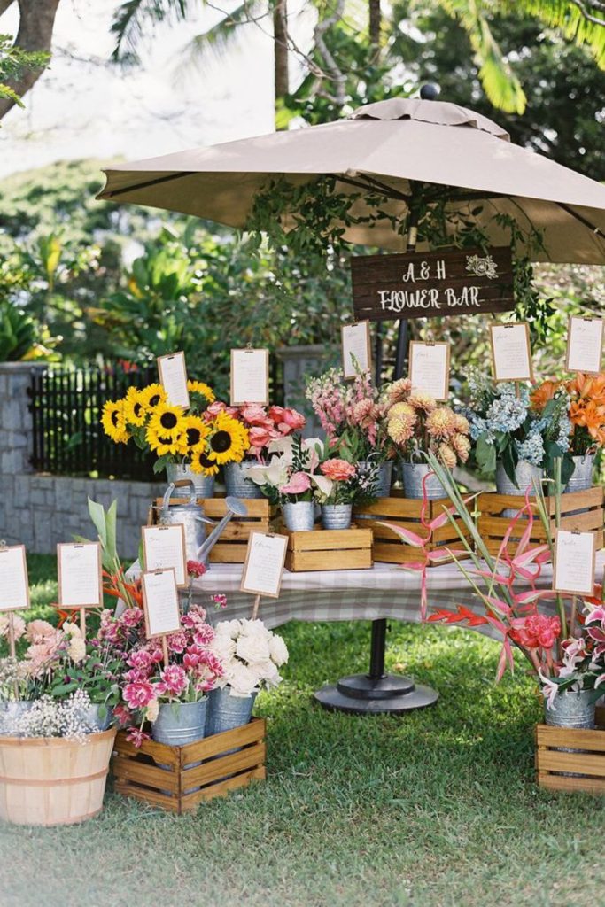 Bright goldenrod clusters in rustic crates