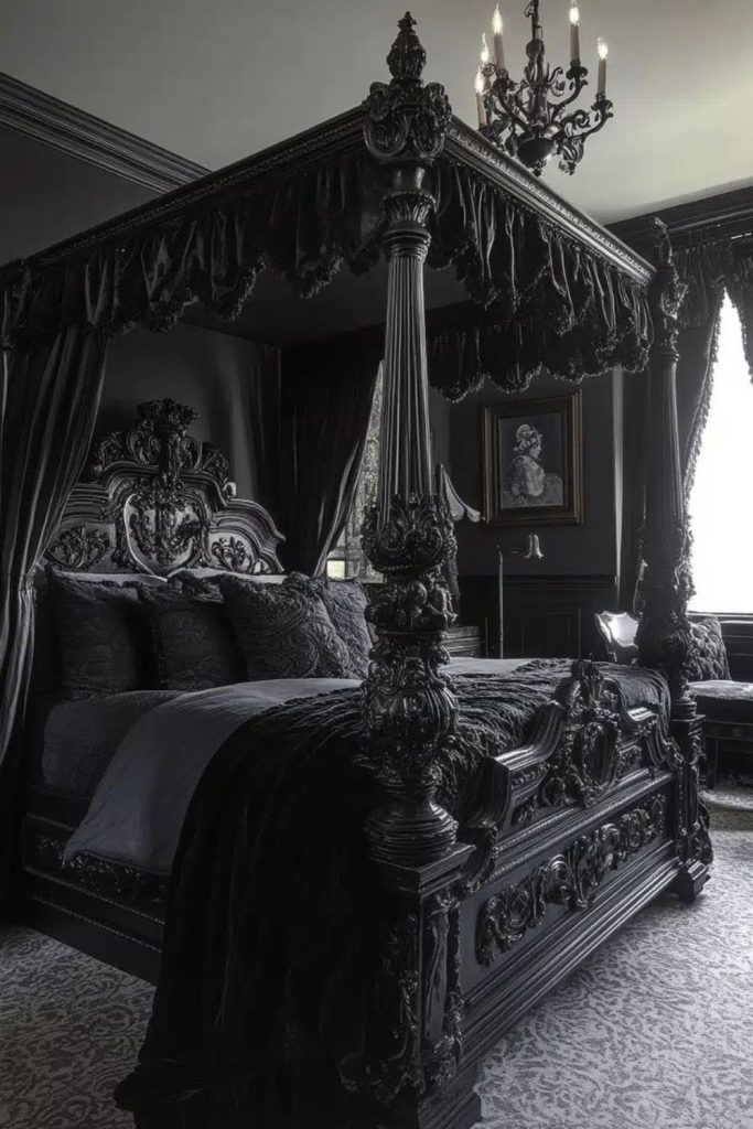 Gothic black canopy bed with sheer drapes.