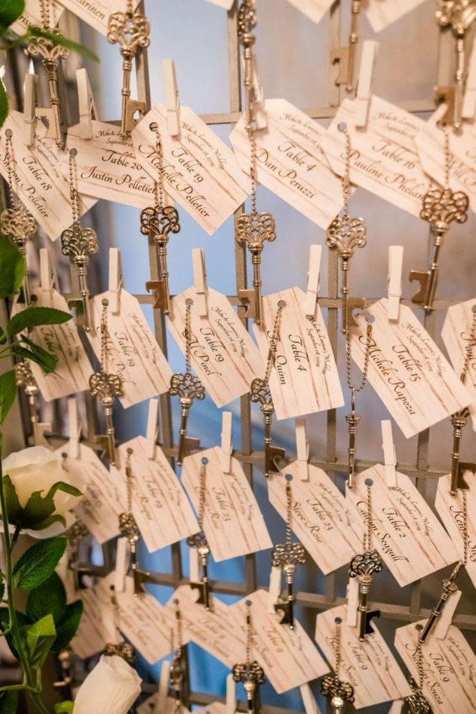 Hanging keys vintage themed wedding seating chart.
